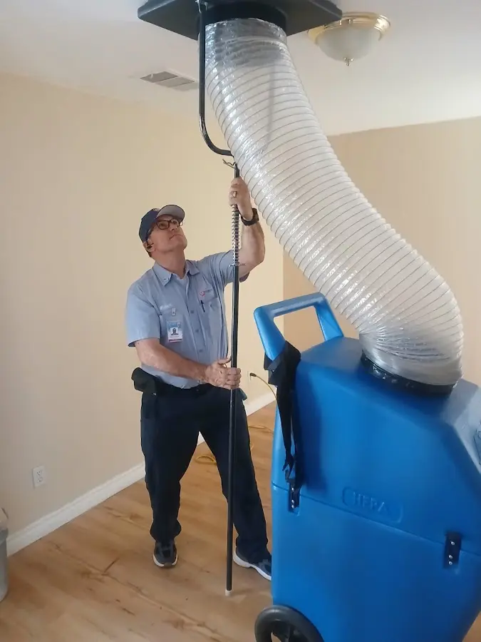 HVAC Installation technician using HEPA equipment in Rothschild